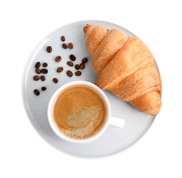 Photo of Fresh croissant and coffee on white background, top view