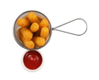 Tasty cheese sticks with ketchup on white background, top view