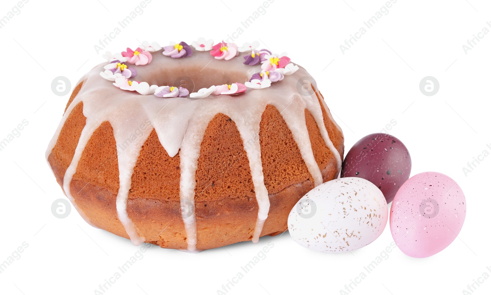 Photo of Festively decorated Easter cake and painted eggs on white background