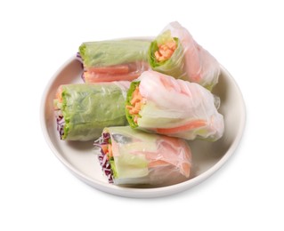 Plate of different delicious spring rolls wrapped in rice paper isolated on white