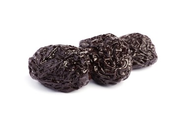 Sweet dried prunes on white background. Healthy snack