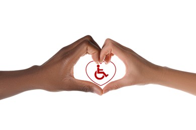 Inclusion concept. Man and woman making heart with hands against international symbol of access on white background, closeup