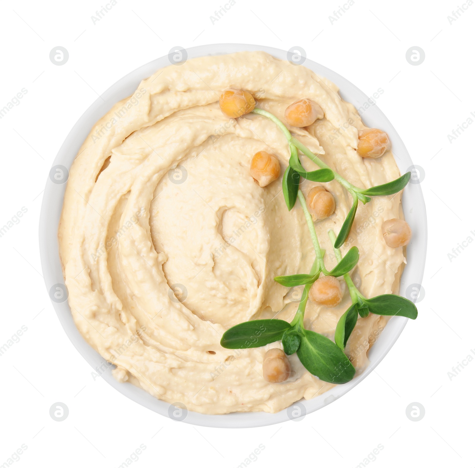 Photo of Bowl of delicious hummus with chickpeas isolated on white, top view