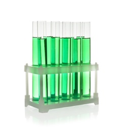 Photo of Test tubes with green liquid on white background