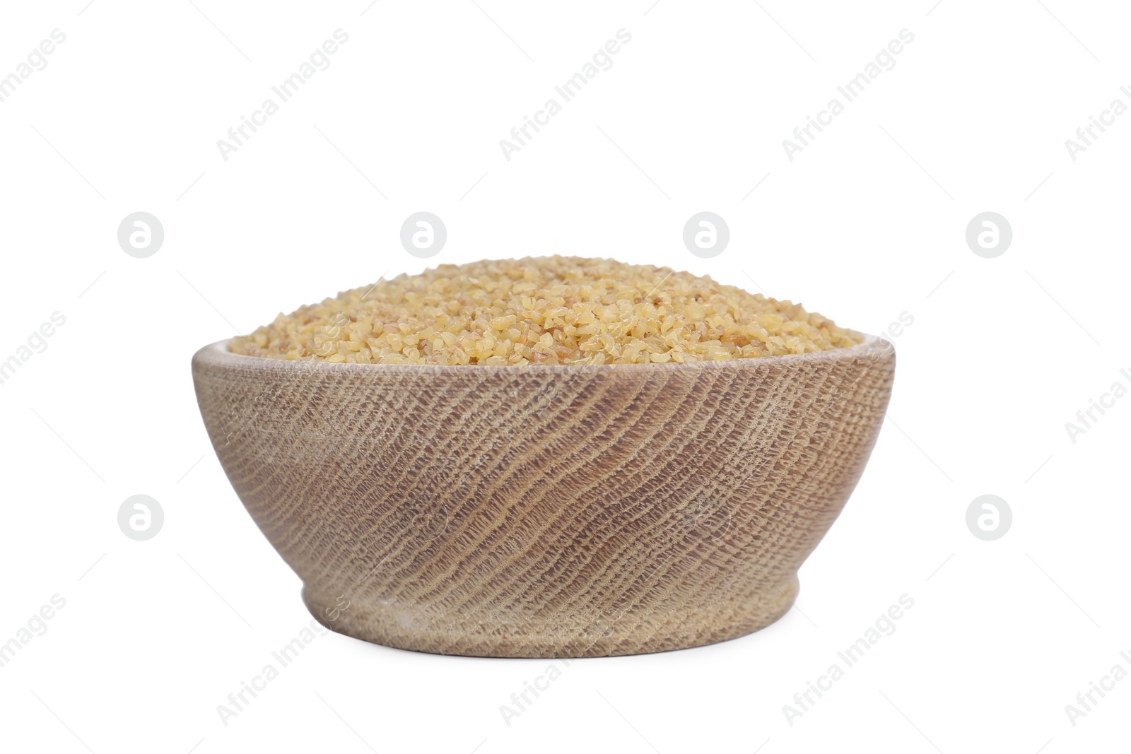 Photo of Wooden bowl with uncooked bulgur isolated on white