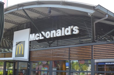 Photo of Winschoten, Netherlands - June 02, 2022: Restaurant McDonald's on city street