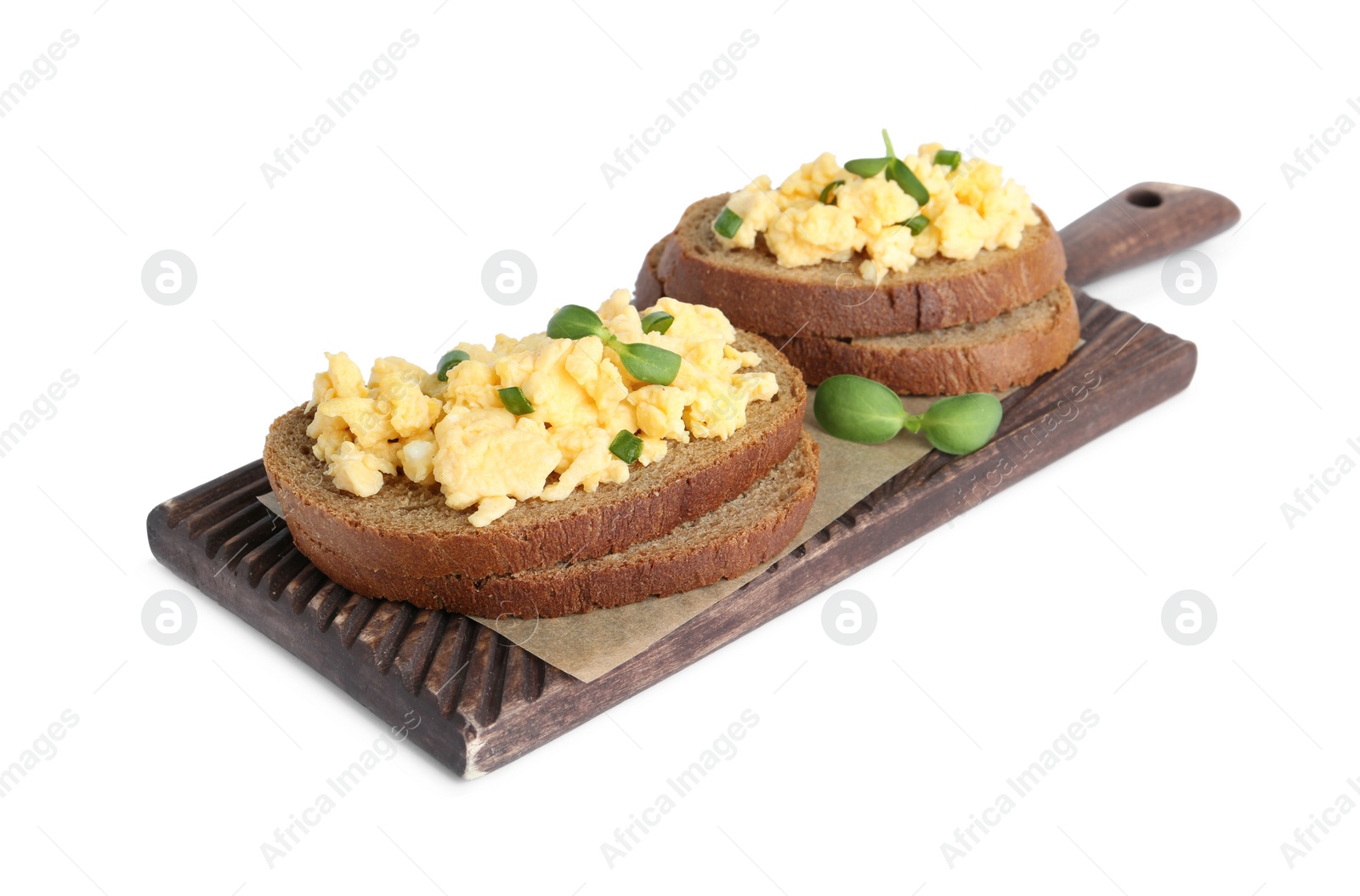 Photo of Tasty scrambled egg sandwiches isolated on white