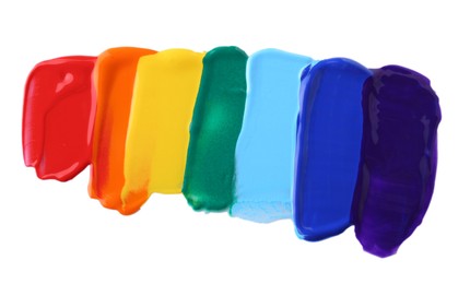 Photo of Multicolored paint samples on white background, top view