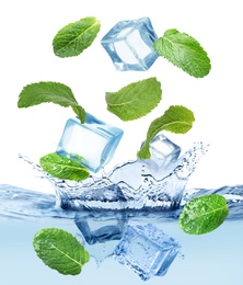 Image of Ice cubes and green mint leaves falling into water on white background