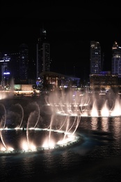DUBAI, UNITED ARAB EMIRATES - NOVEMBER 04, 2018: Famous dancing fountain show on Burj Khalifa lake at night