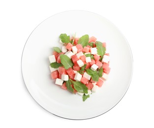 Photo of Delicious salad with watermelon, arugula and feta cheese isolated on white, top view