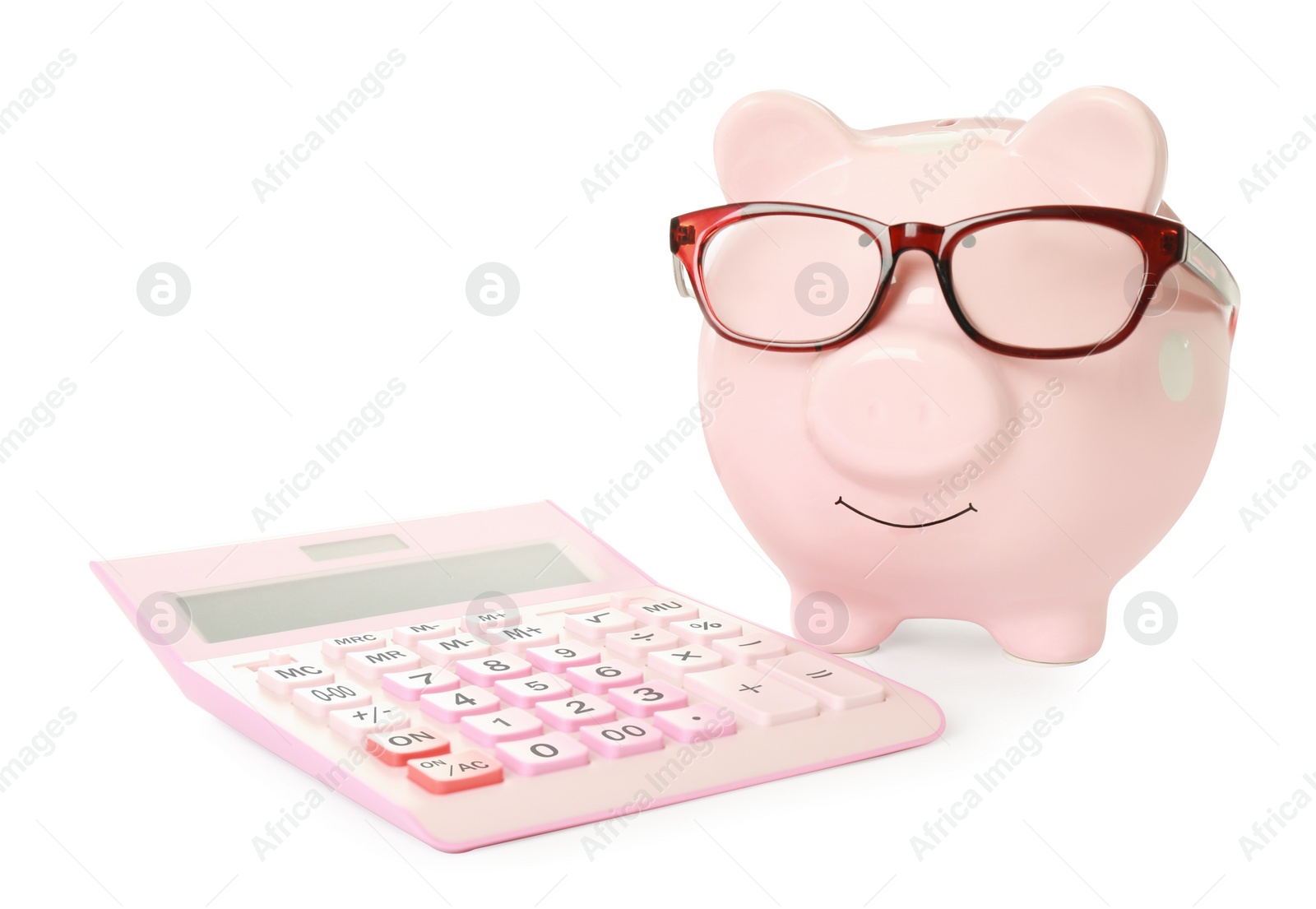 Photo of Piggy bank with glasses and calculator on white background