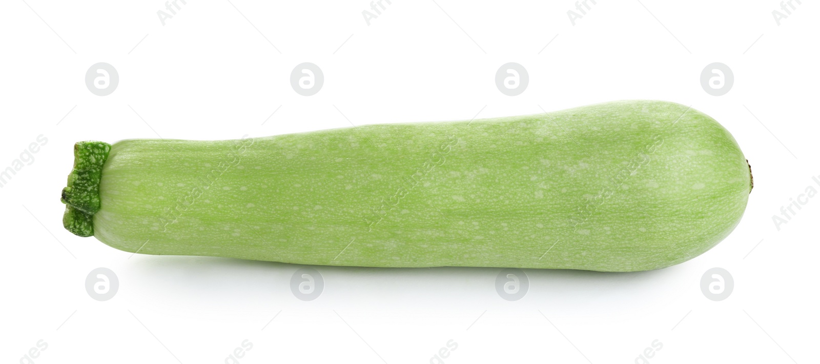 Photo of Fresh ripe green zucchini isolated on white