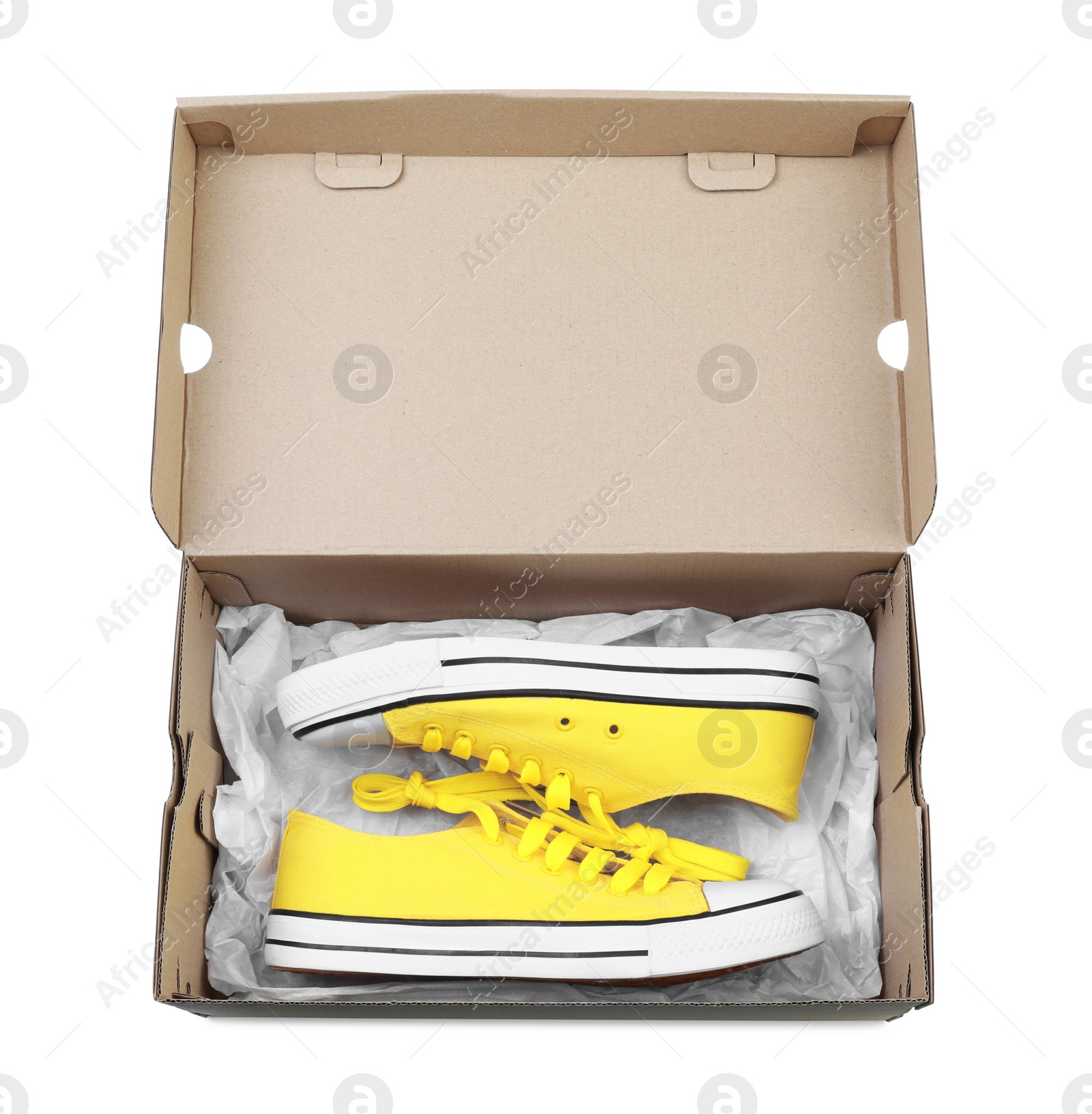 Photo of Pair of stylish sport shoes in cardboard box on white background, top view