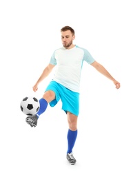 Young man playing football on white background