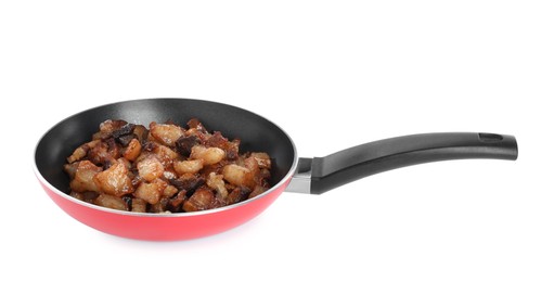 Photo of Tasty cracklings in frying pan isolated on white. Cooked pork lard