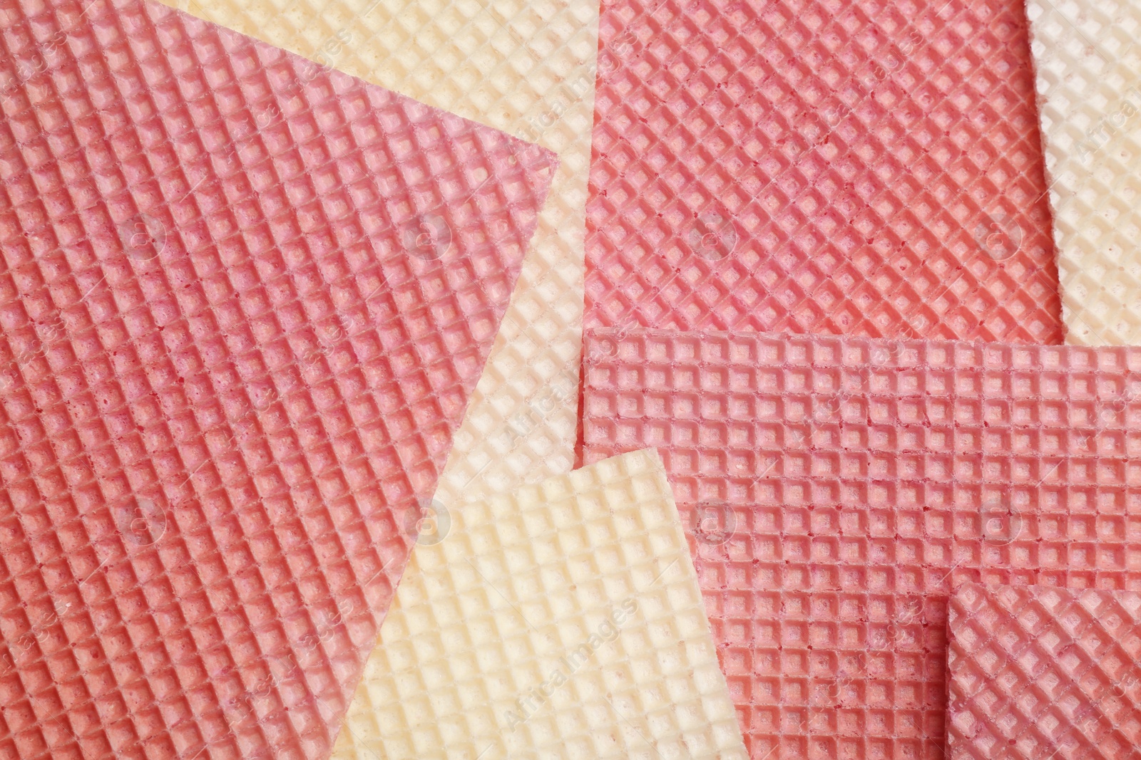 Photo of Tasty wafers as background, closeup. Crispy food