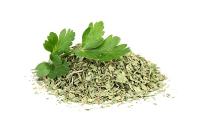 Photo of Heap of dried parsley and fresh twig on white background