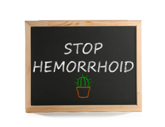 Image of Small blackboard with phrase STOP HEMORRHOID isolated on white