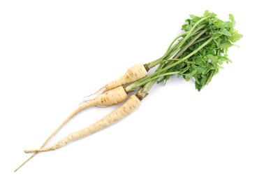 Tasty fresh ripe parsnips on white background, top view