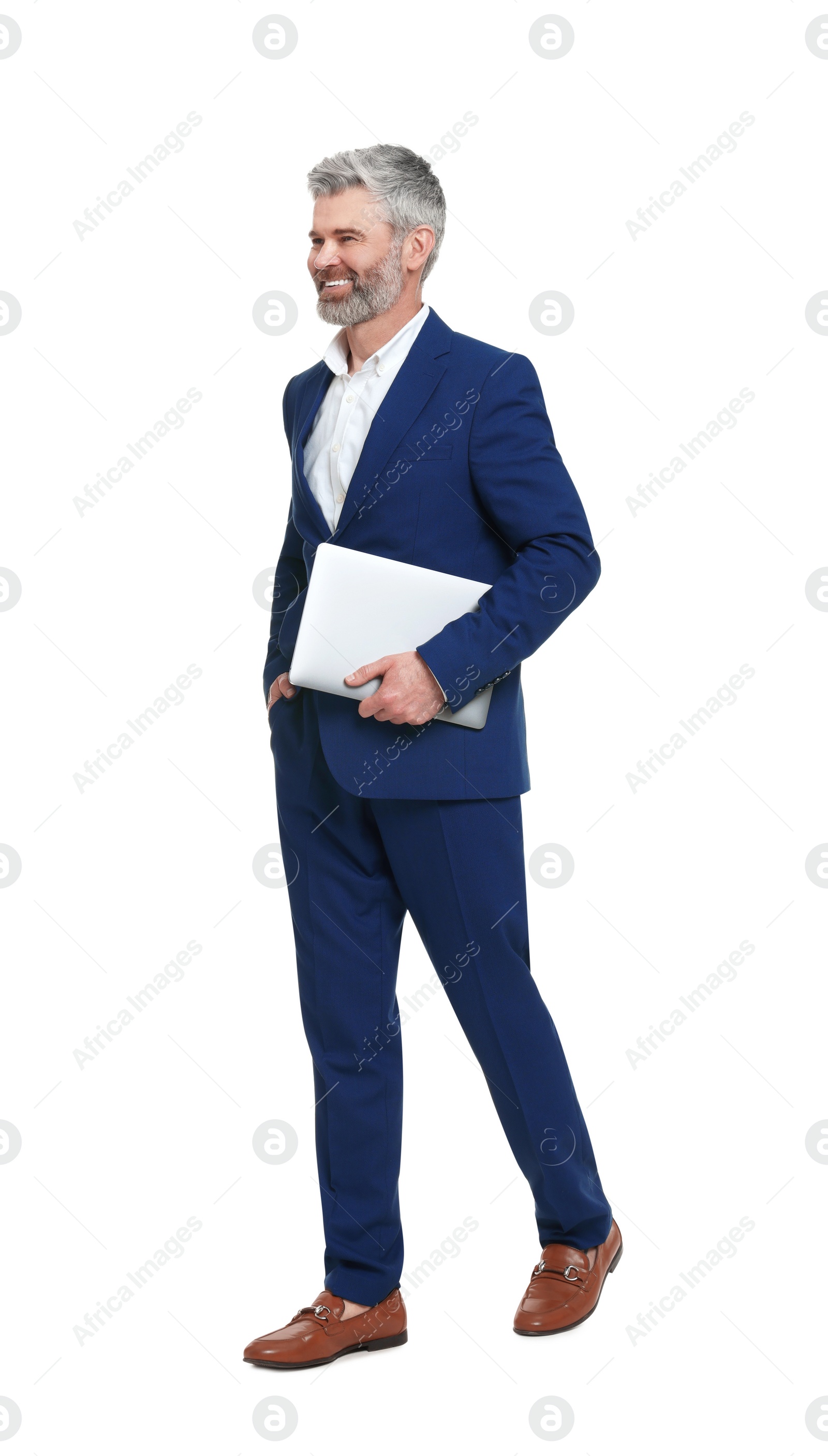 Photo of Mature businessman in stylish clothes with laptop on white background