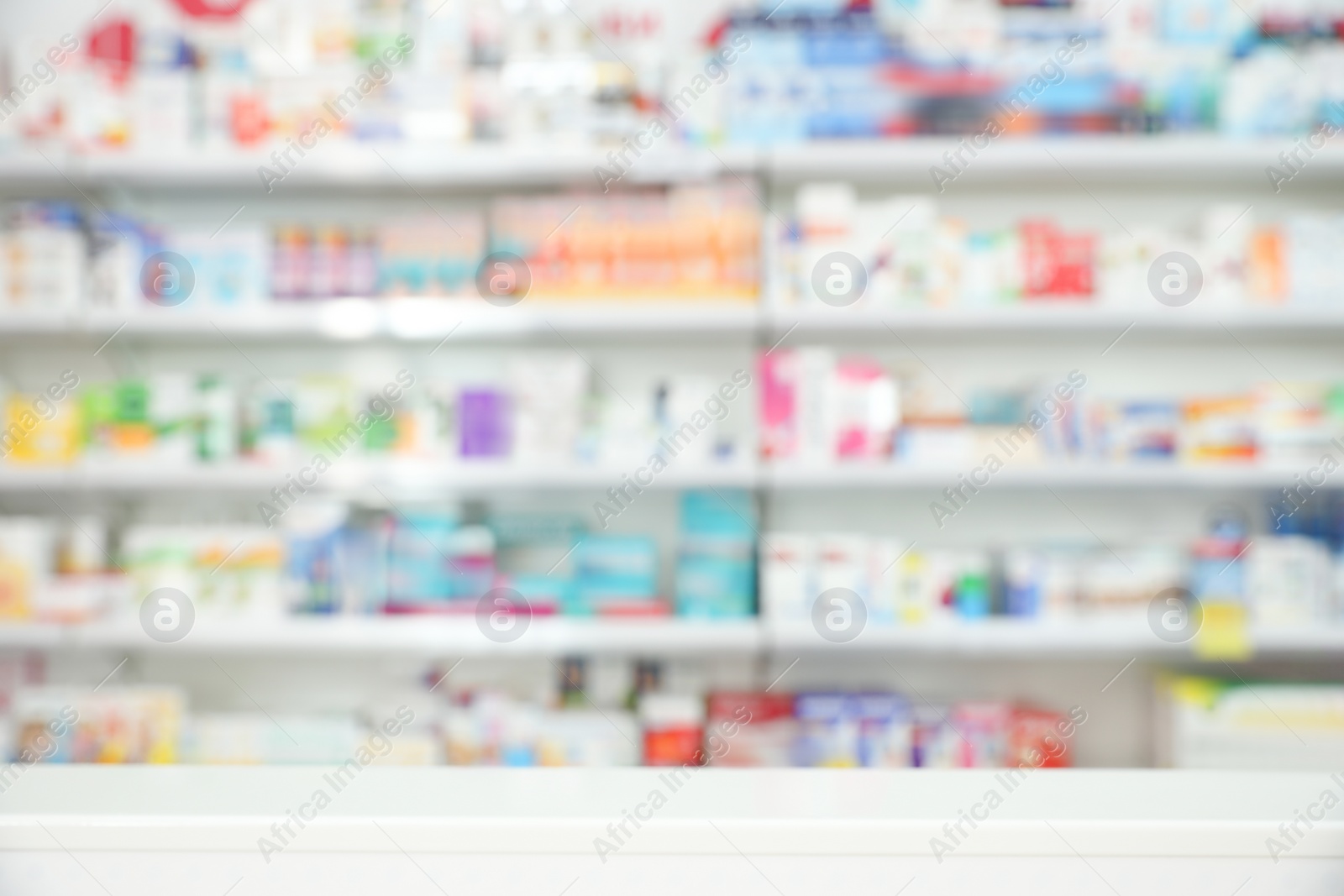 Image of Shelves with pharmaceuticals in drugstore, blurred view