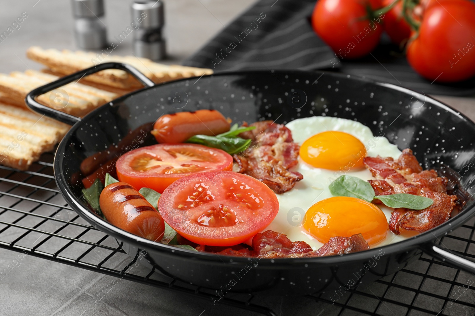 Photo of Delicious breakfast with fried eggs served on table, closeup