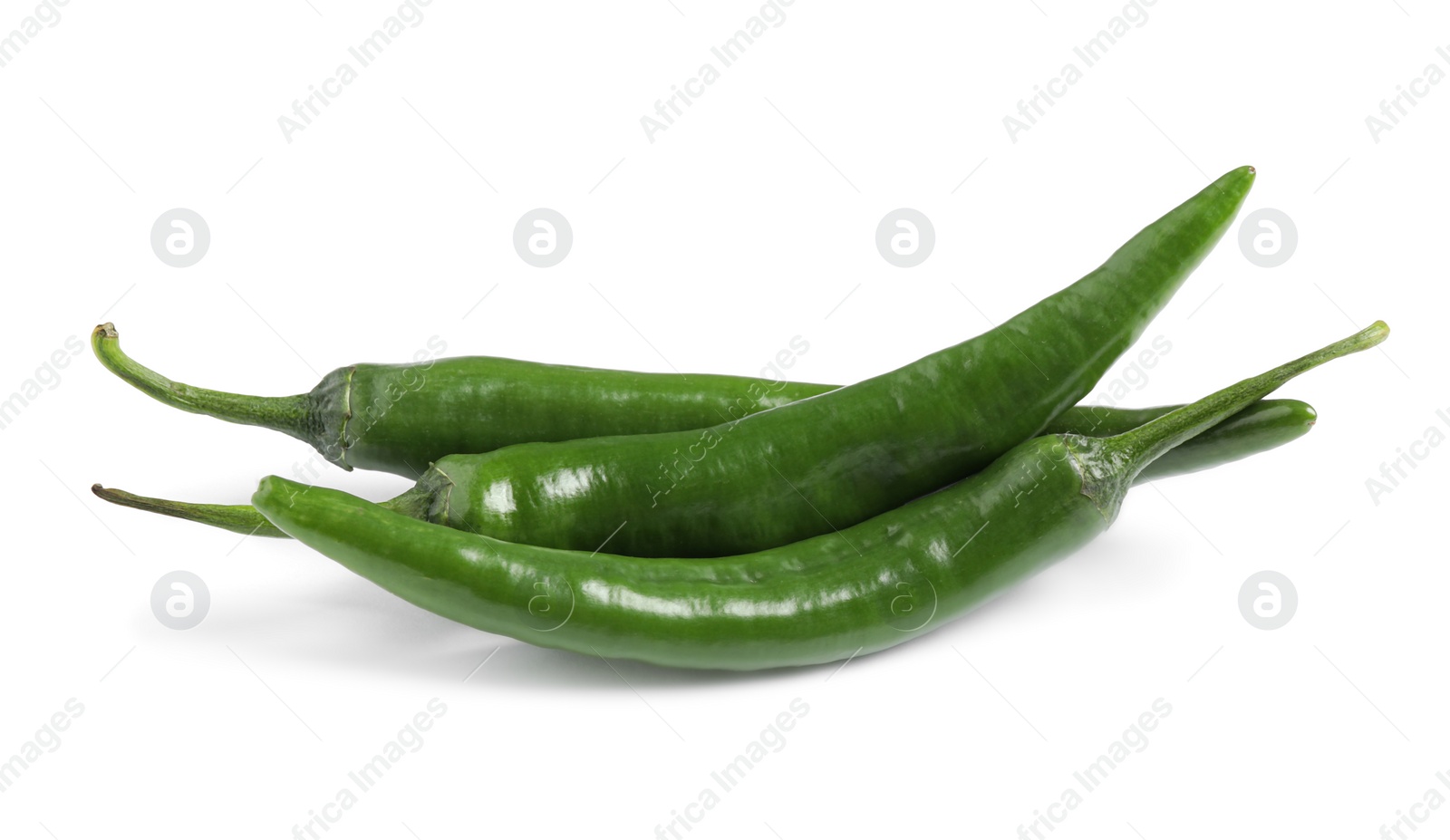 Photo of Green hot chili peppers on white background