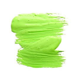 Photo of Abstract brushstroke of green paint isolated on white