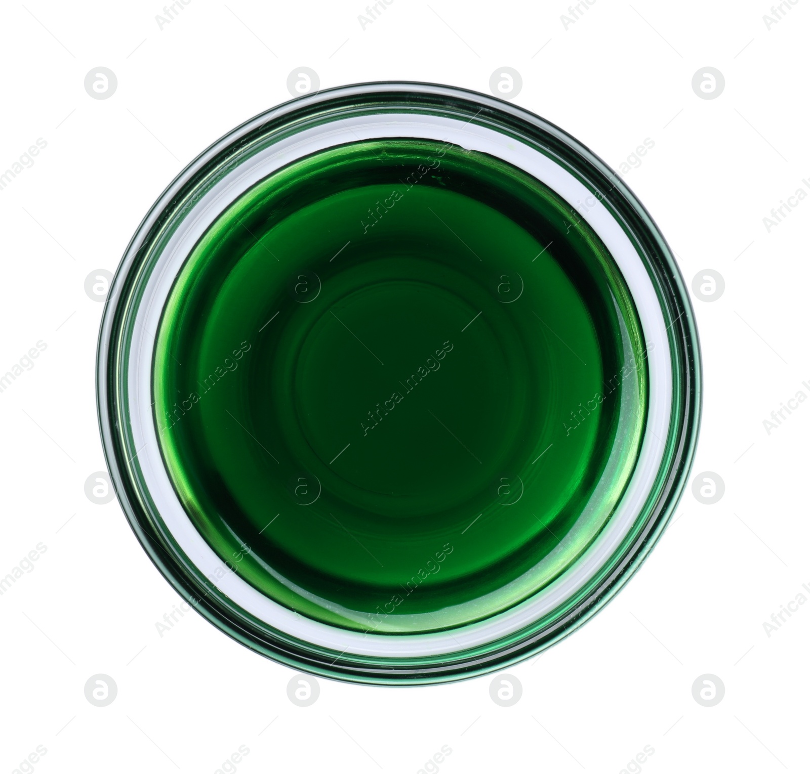 Photo of Glass bowl with green food coloring isolated on white, top view