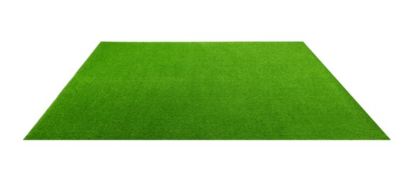 Photo of Green artificial grass carpet isolated on white