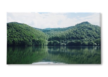 Photo printed on canvas, white background. Picturesque view of beautiful lake surrounded by mountains on sunny day