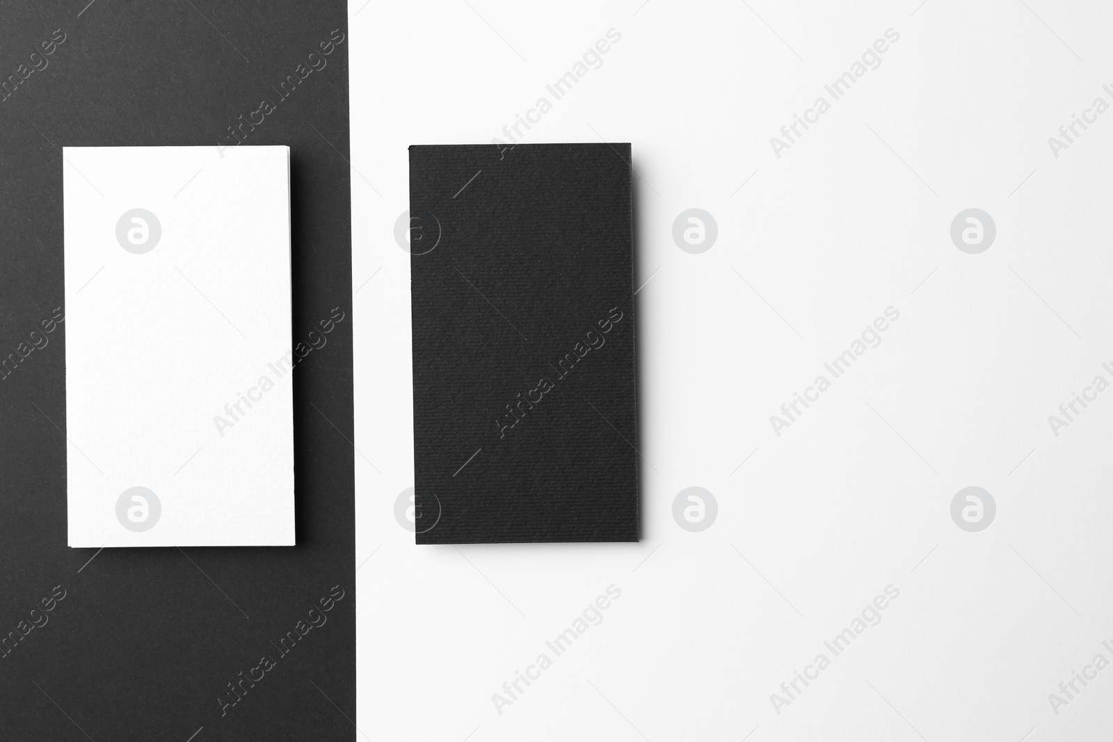 Photo of Blank business cards on color background, flat lay. Mockup for design