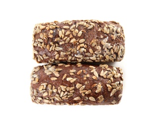 Photo of Loaves of rye bread with sunflower seeds isolated on white, top view