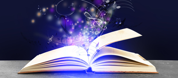 Image of Symphony shining with musical notes from open book on table against dark purple background. Banner design 