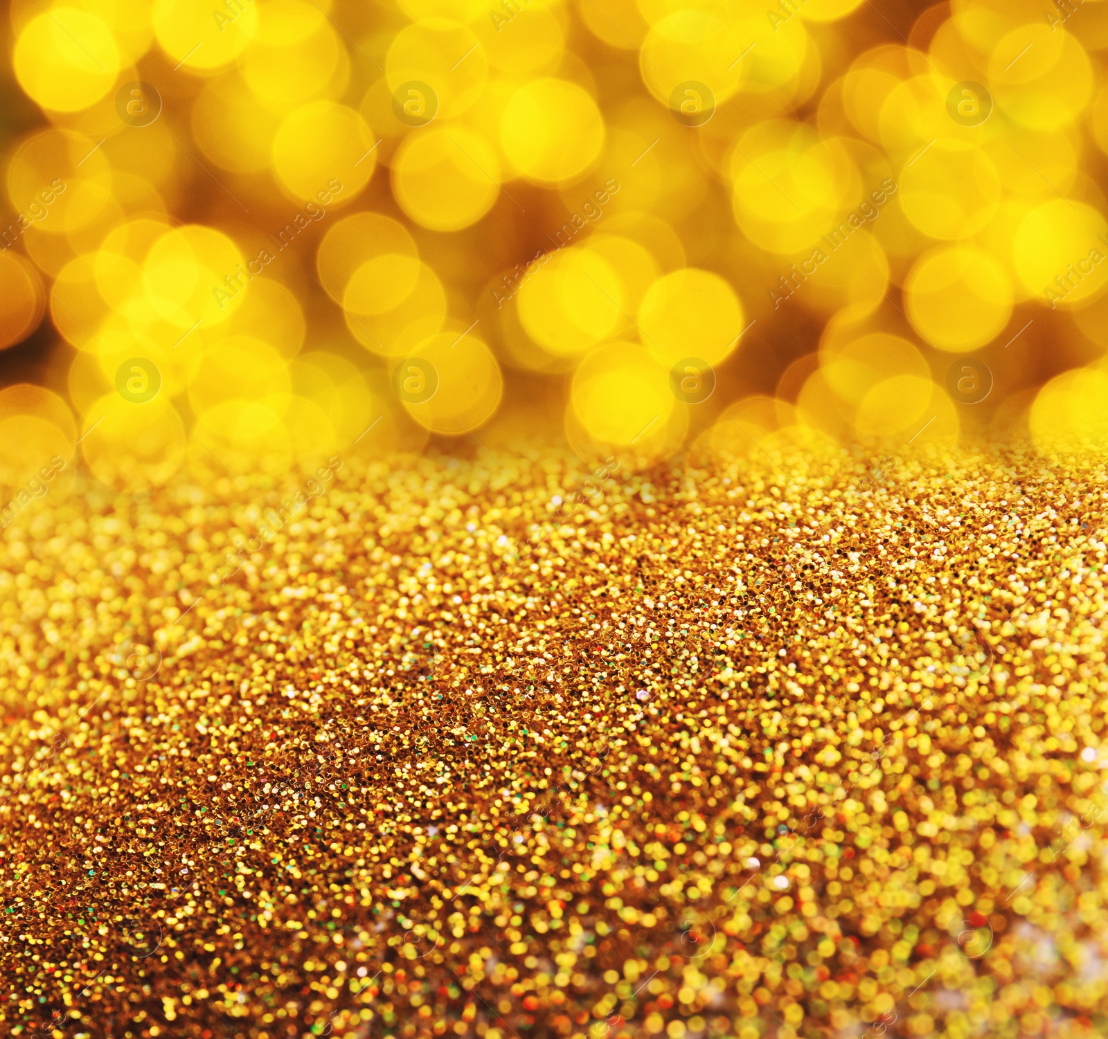 Image of Gold glitter with bokeh effect as abstract background