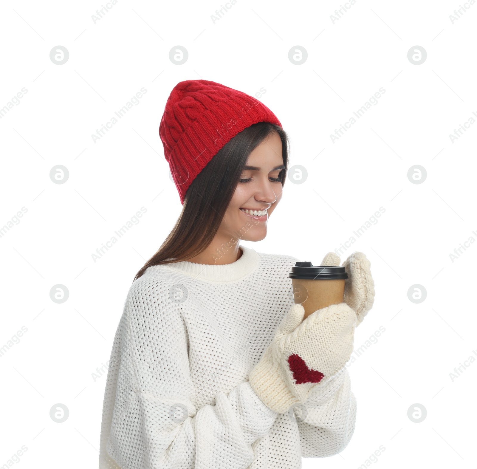 Photo of Happy beautiful woman with paper cup of mulled wine on white background