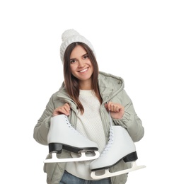 Photo of Happy woman with ice skates on white background