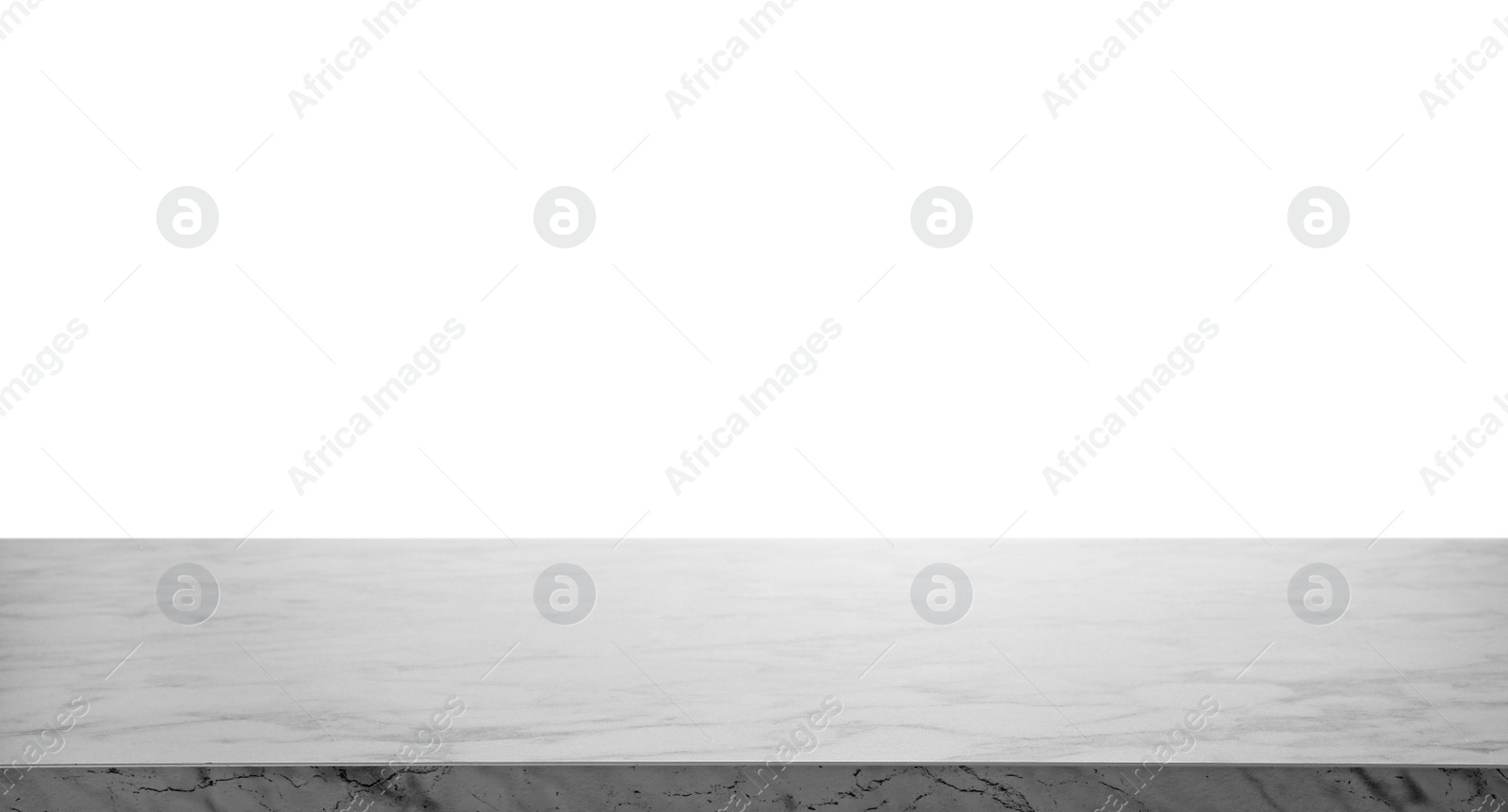 Photo of Empty marble surface isolated on white. Mockup for design