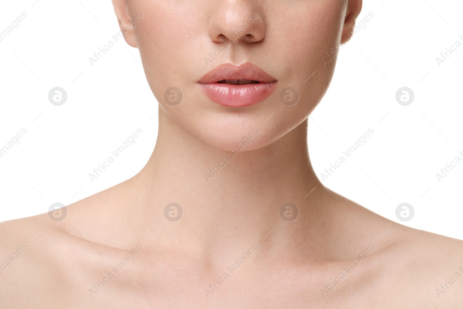 Photo of Woman wearing beautiful lip gloss on white background, closeup