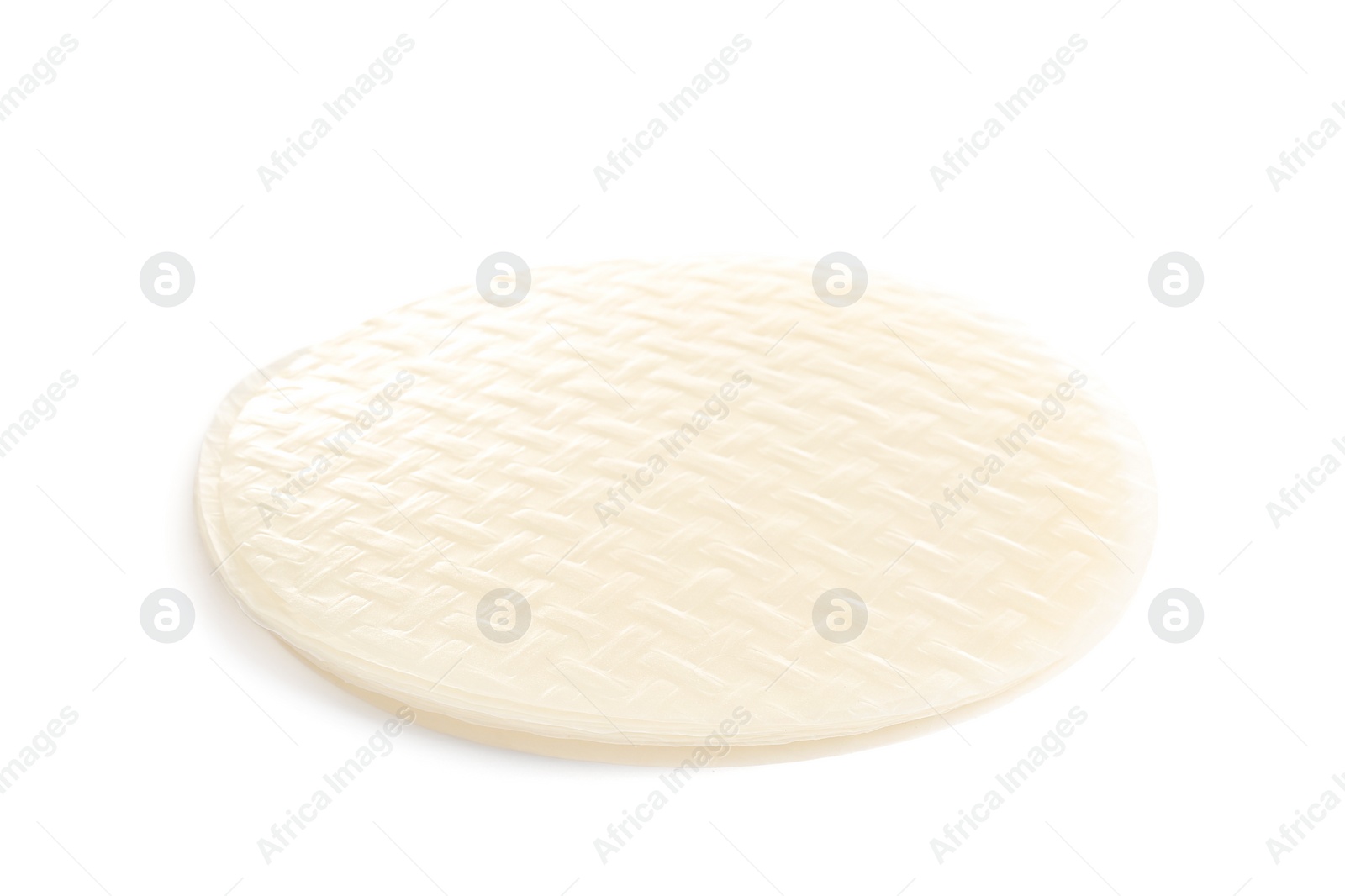Photo of Stack of dry rice paper isolated on white