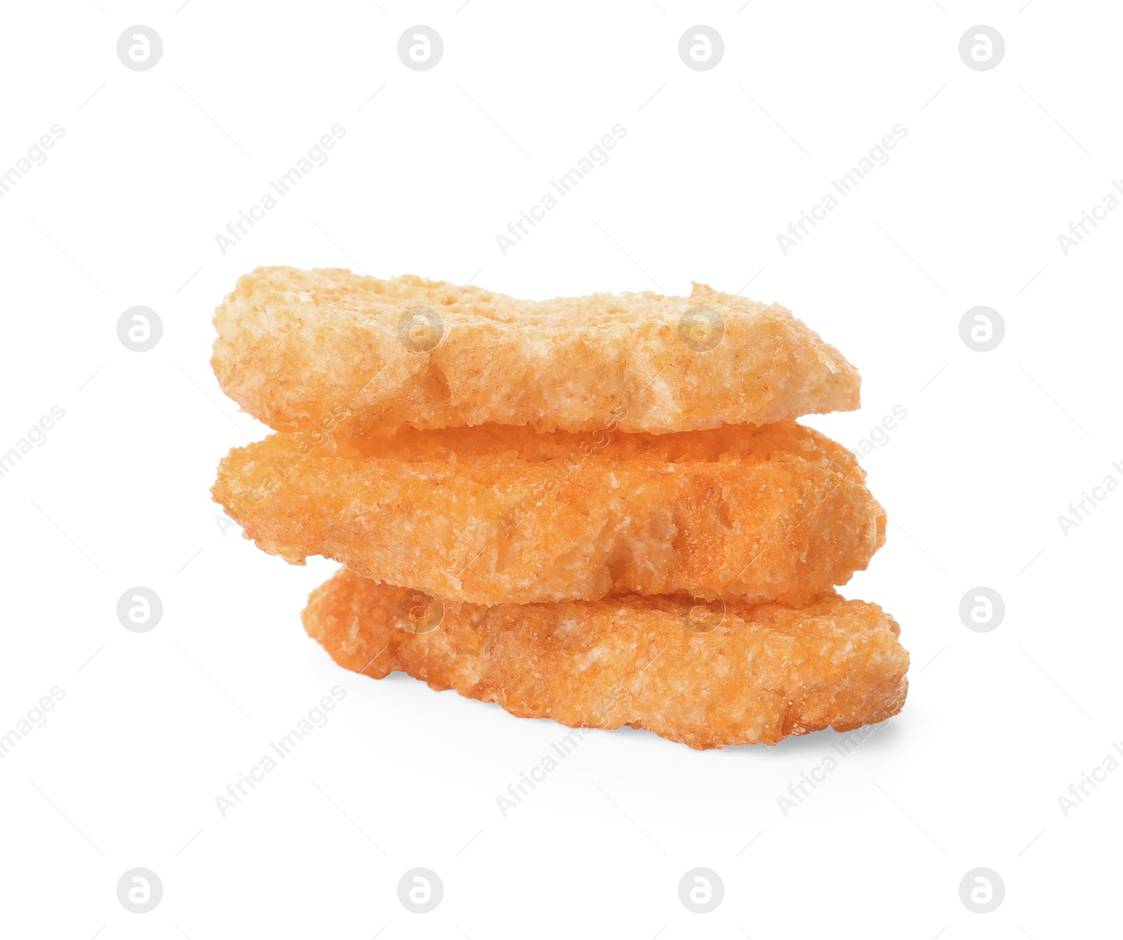 Photo of Stack of delicious crispy rusks on white background