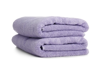 Folded soft terry towels on white background