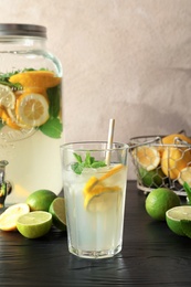 Photo of Glassware with natural lemonade on table