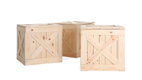 Photo of Group of wooden crates isolated on white