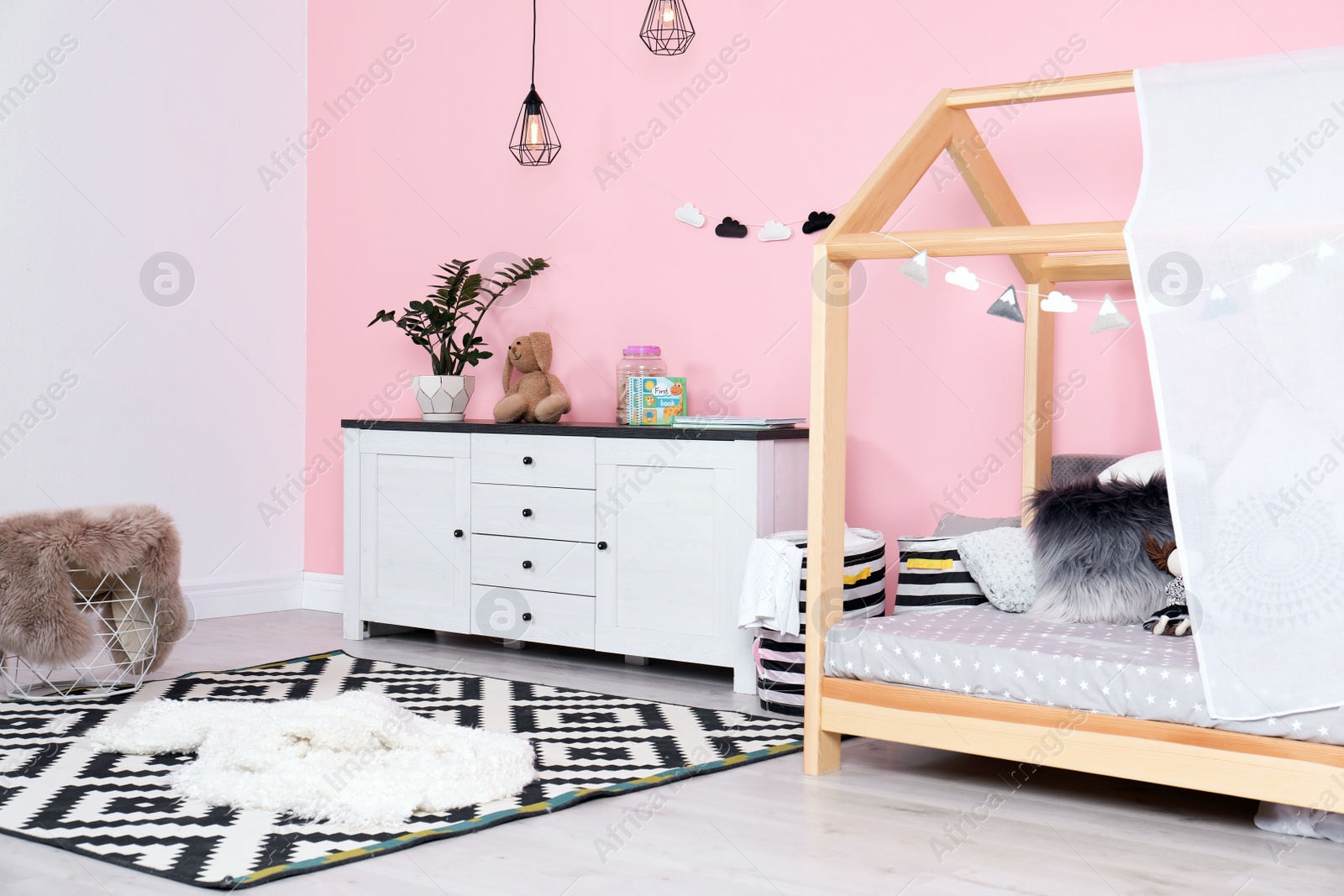 Photo of Modern child's room interior with cute bed