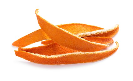 Photo of Dry orange fruit peels on white background