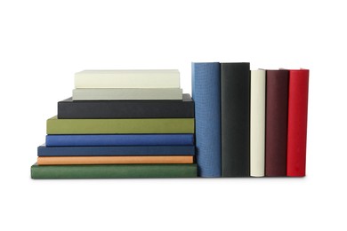 Photo of Many different hardcover books on white background