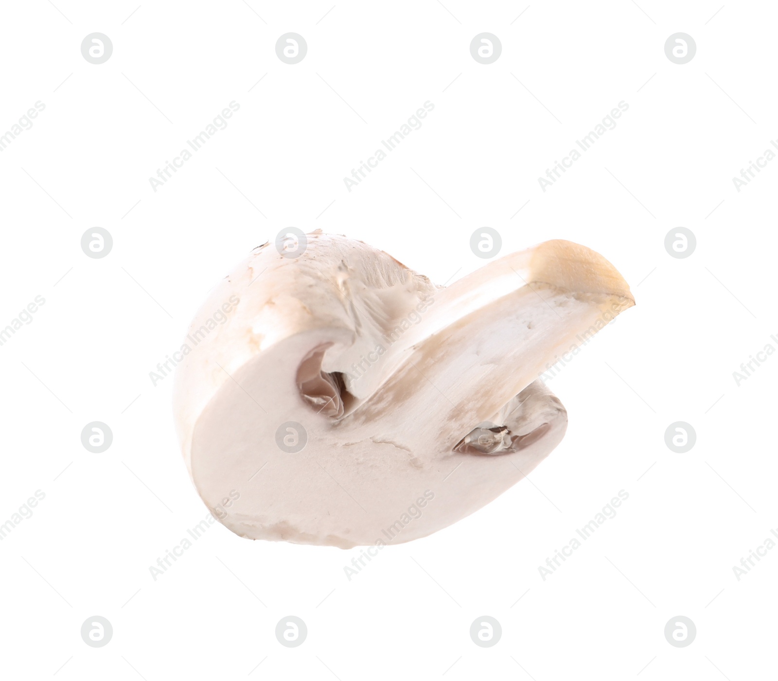 Photo of Piece of fresh champignon mushroom isolated on white