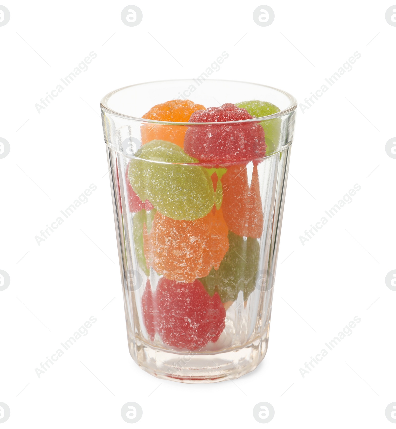 Photo of Delicious gummy candies in glass on white background